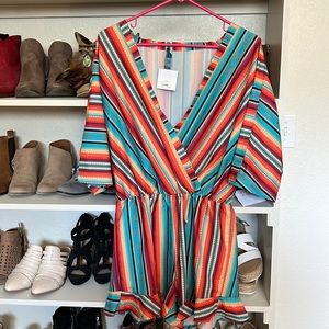 Brand new ruffle romper